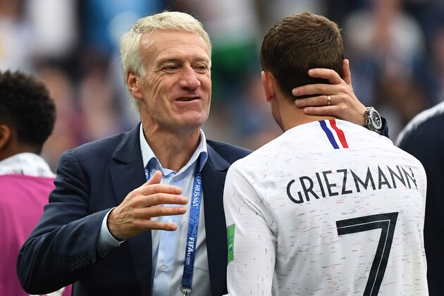 France's coach Didier Deschamps (L) and France's forward Antoine Griezmann celebrate their victory at the end of the Russia 2018 World Cup quarter-final football match between Uruguay and France at the Nizhny Novgorod Stadium in Nizhny Novgorod on July 6, 2018. (Photo by Kirill KUDRYAVTSEV / AFP) / RESTRICTED TO EDITORIAL USE - NO MOBILE PUSH ALERTS/DOWNLOADS        (Photo credit should read KIRILL KUDRYAVTSEV/AFP/Getty Images)