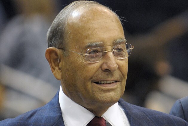 FILE - This Oct. 10, 2010 file photo shows Orlando Magic owner and Amway Inc. co-founder Rich DeVos smiling after welcoming fans to the new Amway Center before a preseason NBA basketball game against the New Orleans Hornets,  in Orlando, Fla. DeVos is recuperating following what was described as a mild stroke last month. Amway, the Michigan-based direct sales company, said Wednesday, Sept. 5, 2012,  that the 86-year-old DeVos was taken Aug. 19 to Spectrum Health Butterworth Hospital in Grand Rapids after having a stroke. (AP Photo/Phelan M. Ebenhack, File)