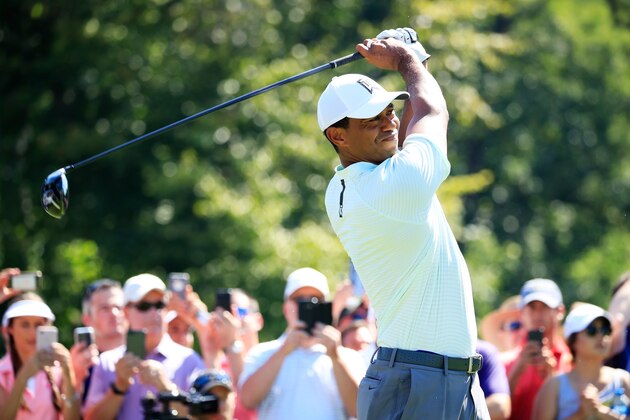 NEWTOWN SQUARE, PA - SEPTEMBER 06:  Tiger Woods of the United States plays his shot from the tenth tee during the first round of the BMW Championship at Aronimink Golf Club on September 6, 2018 in Newtown Square, Pennsylvania.  (Photo by Cliff Hawkins/Getty Images)