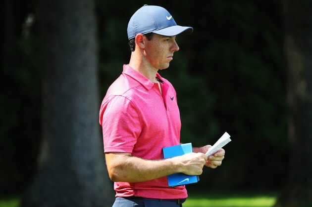 NEWTOWN SQUARE, PA - SEPTEMBER 06:  Rory McIlroy of Northern Ireland checks his yardage book on the 13th tee during the first round of the BMW Championship at Aronimink Golf Club on September 6, 2018 in Newtown Square, Pennsylvania.  (Photo by Gregory Shamus/Getty Images)