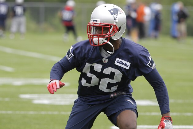 FILE - In this May 22, 2018, file photo, New England Patriots rookie cornerback Duke Dawson warms up during NFL football organized team activities in Foxborough, Mass. The Patriots grabbed the Gators cornerback late in the second round. (AP Photo/Steven Senne, File)