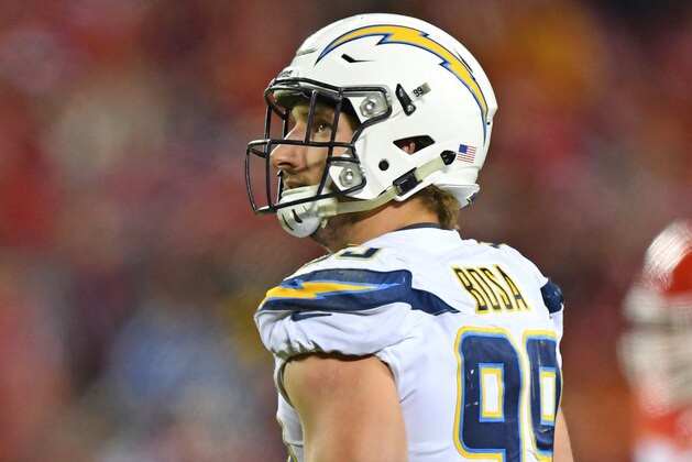 KANSAS CITY, MO - DECEMBER 16:  Defensive end Joey Bosa #99 of the Los Angeles Chargers looks on against the Kansas City Chiefs during the second half at Arrowhead Stadium on December 16, 2017 in Kansas City, Missouri.  (Photo by Peter G. Aiken/Getty Images)