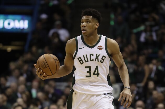 Milwaukee Bucks' Giannis Antetokounmpo dribbles during the first half of Game 3 of an NBA basketball first-round playoff series against the Boston Celtics Friday, April 20, 2018, in Milwaukee. (AP Photo/Morry Gash)