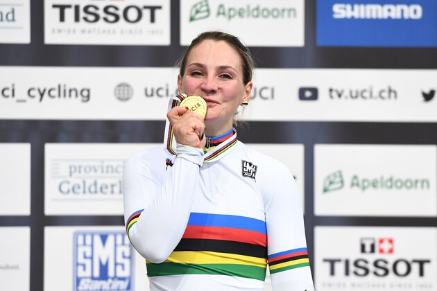 Gold medalist Germany's Kristina Vogel celebrates on the podium after taking part in the women's sprint final during the UCI Track Cycling World Championships in Apeldoorn on March 2, 2018.  / AFP PHOTO / EMMANUEL DUNAND        (Photo credit should read EMMANUEL DUNAND/AFP/Getty Images)