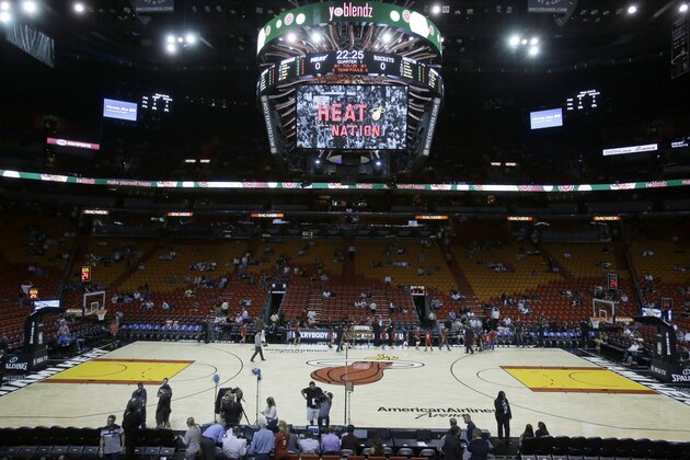 The new floor of the American Airlines Arena is shown before the start of a preseason NBA basketball game between the Miami Heat and the Houston Rockets, Tuesday, Oct. 21, 2014 in Miami. (AP Photo/Wilfredo Lee)