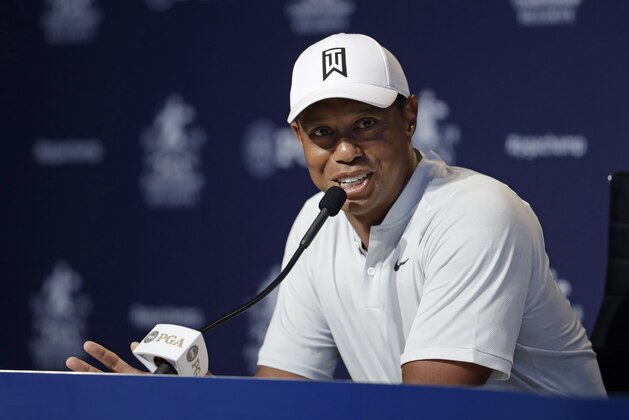Tiger Woods responds to a question during a news conference at the PGA Championship golf tournament at Bellerive Country Club, Tuesday, Aug. 7, 2018, in St. Louis. (AP Photo/Darron Cummings)