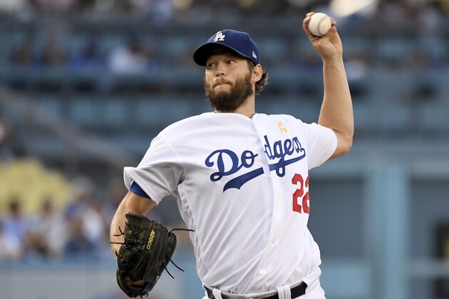 Los Angeles Dodgers pitcher Clayton Kershaw throws to the plate during the first inning of a baseball game against the Arizona Diamondbacks, Saturday, Sept. 1, 2018, in Los Angeles. (AP Photo/Michael Owen Baker)