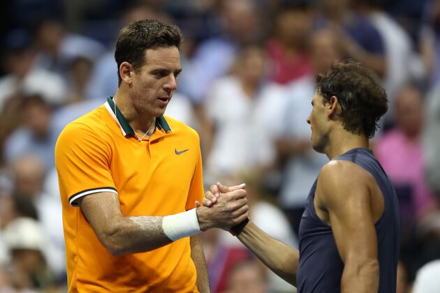 NEW YORK, NY - SEPTEMBER 07:  Rafael Nadal of Spain (R) hugs Juan Martin del Potro of Argentina after he is forced to retire due to injury in his men's singles semi-final match on Day Twelve of the 2018 US Open at the USTA Billie Jean King National Tennis Center on September 7, 2018 in the Flushing neighborhood of the Queens borough of New York City.  (Photo by Julian Finney/Getty Images)