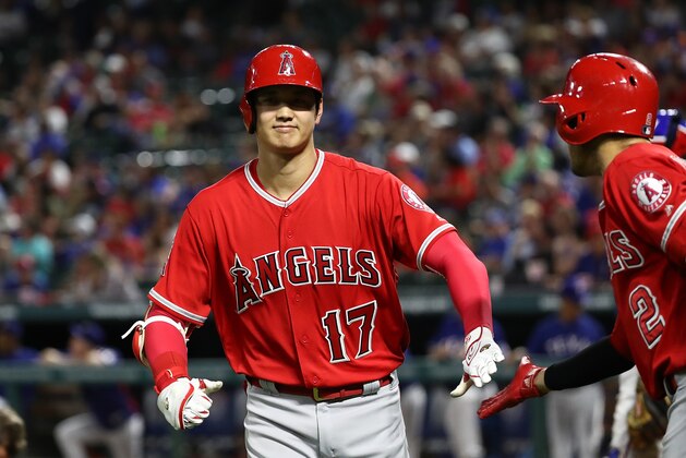 ARLINGTON, TX - SEPTEMBER 05:  Shohei Ohtani #17 of the Los Angeles Angels hits a homerun against the Texas Rangers in the fifth inning at Globe Life Park in Arlington on September 5, 2018 in Arlington, Texas.  (Photo by Ronald Martinez/Getty Images)