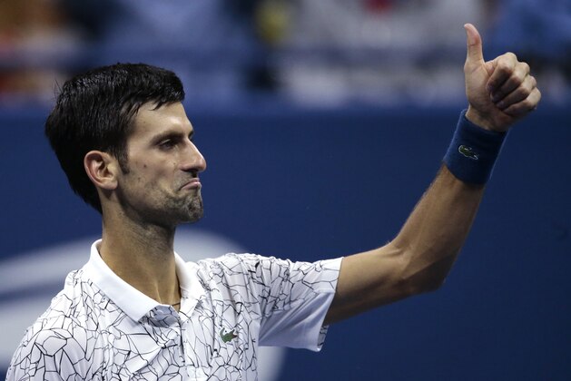 Novak Djokovic, of Serbia, reacts after winning a point against Kei Nishikori, of Japan, during the semifinals of the U.S. Open tennis tournament, Friday, Sept. 7, 2018, in New York. (AP Photo/Andres Kudacki)