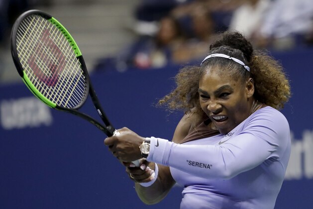 Serena Williams returns a shot to Anastasija Sevastova, of Latvia, during the semifinals of the U.S. Open tennis tournament, Thursday, Sept. 6, 2018, in New York. (AP Photo/Julio Cortez)
