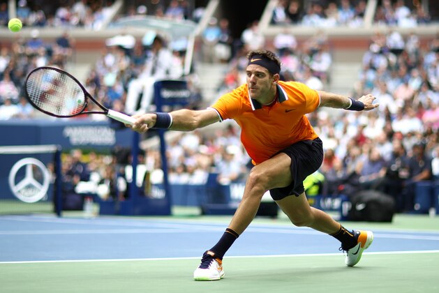 NEW YORK, NY - SEPTEMBER 07:  Juan Martin del Potro of Argentina stretches for a backhand in his match against Rafael Nadal of Spain in the men's singles semi-final match on Day Twelve of the 2018 US Open at the USTA Billie Jean King National Tennis Center on September 7, 2018 in the Flushing neighborhood of the Queens borough of New York City.  (Photo by Julian Finney/Getty Images)