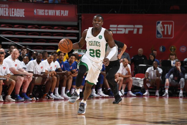 LAS VEGAS, NV - JULY 12:  Jabari Bird #26 of the Boston Celtics handles the ball against the New York Knicks during the 2018 Las Vegas Summer League on July 12, 2018 at the Thomas & Mack Center in Las Vegas, Nevada. NOTE TO USER: User expressly acknowledges and agrees that, by downloading and/or using this Photograph, user is consenting to the terms and conditions of the Getty Images License Agreement. Mandatory Copyright Notice: Copyright 2018 NBAE (Photo by Garrett Ellwood/NBAE via Getty Images)