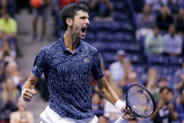 Novak Djokovic, of Serbia, celebrates after defeating Kei Nishikori, of Japan, during the semifinals of the U.S. Open tennis tournament, Friday, Sept. 7, 2018, in New York. (AP Photo/Seth Wenig)