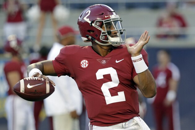 Alabama quarterback Jalen Hurts warms up before the first half of an NCAA college football game, Saturday, Sept. 1, 2018, in Orlando, Fla. (AP Photo/John Raoux)