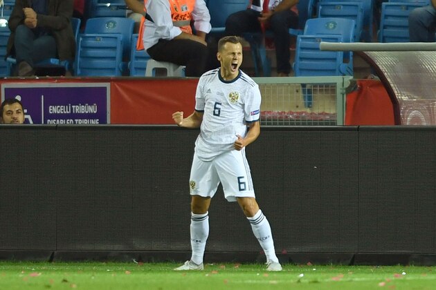 Russia's Denis Cheryshev celebrates after scoring a goal during the UEFA Nations League football match between Turkey v Russia at Senol Gunes Sport complex stadium in Trabzon on September 7, 2018. (Photo by OZAN KOSE / AFP)        (Photo credit should read OZAN KOSE/AFP/Getty Images)