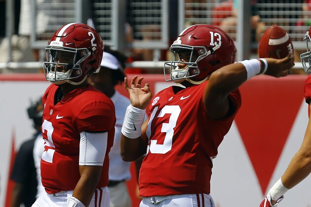 Alabama quarterback Tua Tagovailoa (13) warms up before the start of the first half of an NCAA college football game against Arkansas State, Saturday, Sept. 8, 2018, in Tuscaloosa, Ala. (AP Photo/Butch Dill)