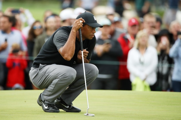 NEWTOWN SQUARE, PA - SEPTEMBER 08:  Tiger Woods of the United States lines up a putt on the tenth green during the third round of the BMW Championship at Aronimink Golf Club on September 8, 2018 in Newtown Square, Pennsylvania.  (Photo by Gregory Shamus/Getty Images)