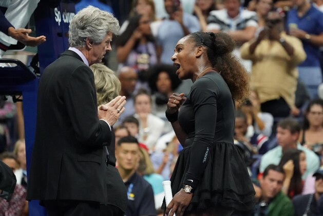 Serena Williams of the United States argues with referee Brian Earley during her Women's Singles finals match against Naomi Osaka of Japan at the 2018 US Open at the USTA Billie Jean King National Tennis Center in New York on September 8, 2018. - Osaka, 20, triumphed 6-2, 6-4 in the match marred by Williams's second set outburst, the American enraged by umpire Carlos Ramos's warning for receiving coaching from her box. She tearfully accused him of being a 'thief' and demanded an apology from the official. (Photo by TIMOTHY A. CLARY / AFP)        (Photo credit should read TIMOTHY A. CLARY/AFP/Getty Images)