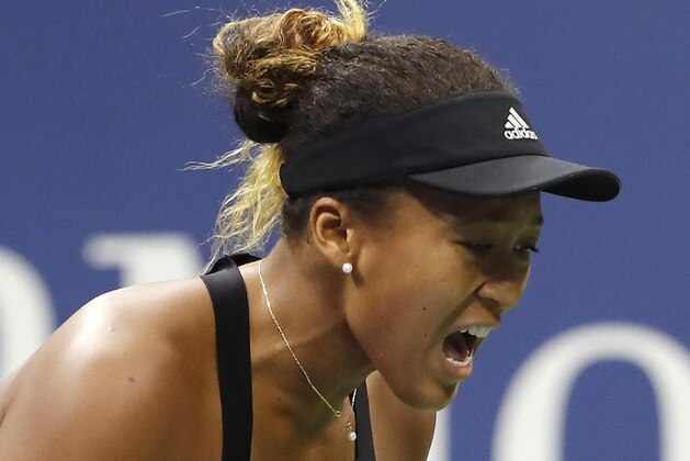 Naomi Osaka, of Japan, reacts after defeating Serena Williams in the women's final of the U.S. Open tennis tournament, Saturday, Sept. 8, 2018, in New York. (AP Photo/Adam Hunger)