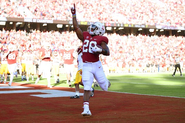 PALO ALTO, CA - SEPTEMBER 08:  Bryce Love #20 of the Stanford Cardinal celebrates after scoring on a seven yard touchdown run against the USC Trojans in the first quarter of an NCAA football game at Stanford Stadium on September 8, 2018 in Palo Alto, California.  (Photo by Thearon W. Henderson/Getty Images)