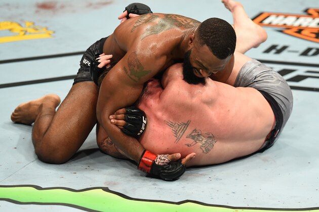DALLAS, TX - SEPTEMBER 08:  (L-R) Tyron Woodley attempts to submit Darren Till of England in their UFC welterweight championship fight during the UFC 228 event at American Airlines Center on September 8, 2018 in Dallas, Texas. (Photo by Josh Hedges/Zuffa LLC/Zuffa LLC via Getty Images)