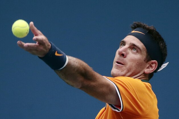 Juan Martin del Potro, of Argentina, serves to Rafael Nadal, of Spain, during the semifinals of the U.S. Open tennis tournament, Friday, Sept. 7, 2018, in New York. (AP Photo/Andres Kudacki)