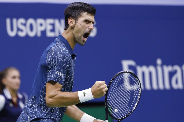 Novak Djokovic, of Serbia, reacts after breaking the serve of Kei Nishikori, of Japan, during the semifinals of the U.S. Open tennis tournament, Friday, Sept. 7, 2018, in New York. (AP Photo/Adam Hunger)