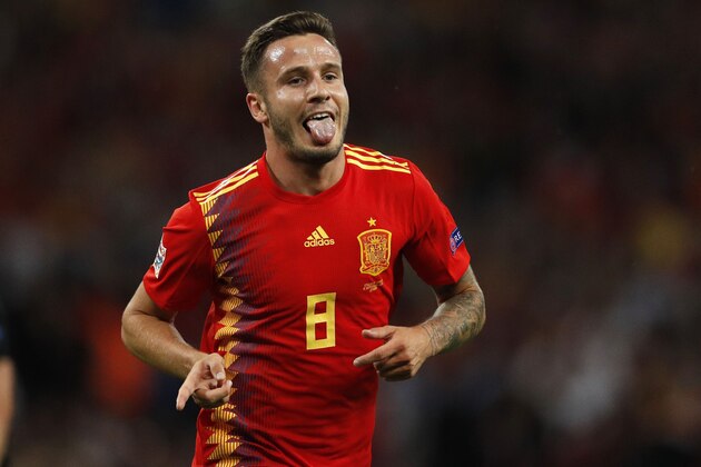 Spain's midfielder Saul Niguez celebrates after scoring their first goal during the UEFA Nations League football match between England and Spain at Wembley Stadium in London on September 8, 2018. (Photo by Adrian DENNIS / AFP) / NOT FOR MARKETING OR ADVERTISING USE / RESTRICTED TO EDITORIAL USE        (Photo credit should read ADRIAN DENNIS/AFP/Getty Images)