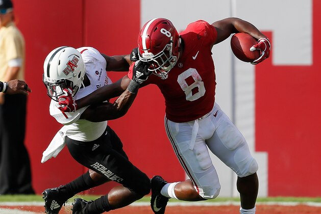 TUSCALOOSA, AL - SEPTEMBER 08:  Jerry Jacobs #1 of the Arkansas State Red Wolves is flagged for this facemask as he attempts to tackle Josh Jacobs #8 of the Alabama Crimson Tide at Bryant-Denny Stadium on September 8, 2018 in Tuscaloosa, Alabama.  (Photo by Kevin C. Cox/Getty Images)