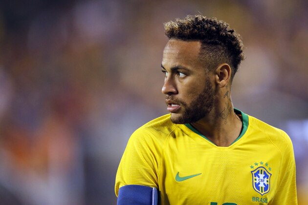 Brazil's foward Neymar looks on during his friendly football match against the US at the Metlife Stadium in East Rutherford, New Jersey on September 7, 2018. (Photo by EDUARDO MUNOZ ALVAREZ / AFP)        (Photo credit should read EDUARDO MUNOZ ALVAREZ/AFP/Getty Images)