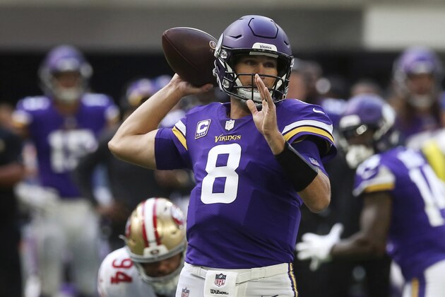 Minnesota Vikings quarterback Kirk Cousins throws a pass during the first half of an NFL football game against the San Francisco 49ers, Sunday, Sept. 9, 2018, in Minneapolis. (AP Photo/Jim Mone)