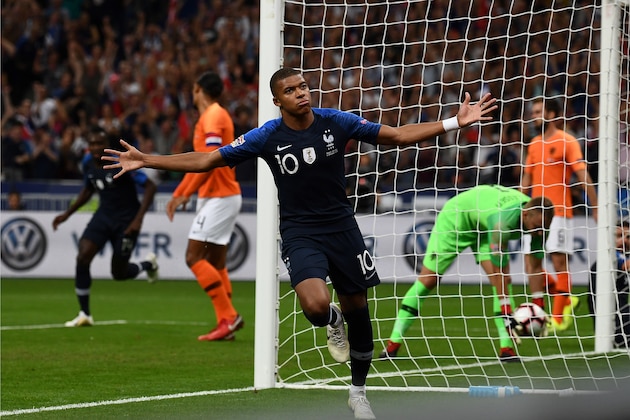 France's midfielder Kylian Mbappe celebrates after scoring a goal during the UEFA Nations League football match between France and Netherlands at the Stade de France stadium, in Saint-Denis, northern of Paris, on September 9, 2018. (Photo by Anne-Christine POUJOULAT / AFP)        (Photo credit should read ANNE-CHRISTINE POUJOULAT/AFP/Getty Images)