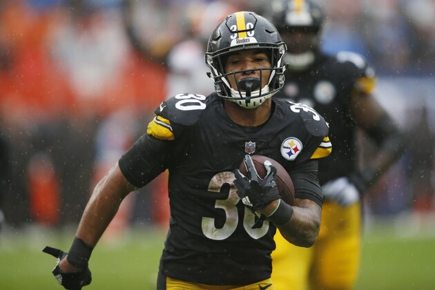 Pittsburgh Steelers running back James Conner (30) rushes for a 22-yard touchdown during the second half of an NFL football game against the Cleveland Browns, Sunday, Sept. 9, 2018, in Cleveland. (AP Photo/Ron Schwane)
