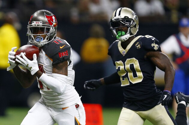 Tampa Bay Buccaneers wide receiver DeSean Jackson (11) pulls in a touchdown reception in front of New Orleans Saints cornerback Ken Crawley (20) in the second half of an NFL football game in New Orleans, Sunday, Sept. 9, 2018. (AP Photo/Butch Dill)