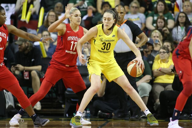 SEATTLE, WA - SEPTEMBER 9: Breanna Stewart #30 of the Seattle Storm handles the ball against Elena Delle Donne #11 of the Washington Mystics during Game Two of the 2018 WNBA Finals on September 9, 2018 at Key Arena in Seattle, Washington. NOTE TO USER: User expressly acknowledges and agrees that, by downloading and/or using this Photograph, user is consenting to the terms and conditions of Getty Images License Agreement. Mandatory Copyright Notice: Copyright 2018 NBAE (Photo by Scott Eklund/NBAE via Getty Images)