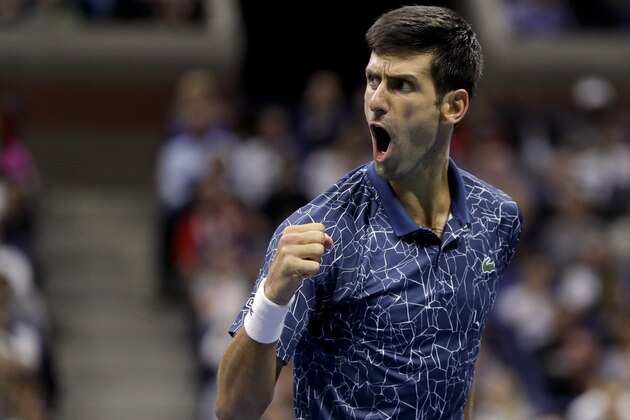 Novak Djokovic, of Serbia, reacts during a match against Juan Martin del Potro, of Argentina, in the men's final of the U.S. Open tennis tournament, Sunday, Sept. 9, 2018, in New York. (AP Photo/Julio Cortez)