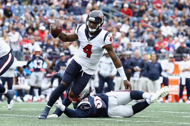 FOXBOROUGH, MA - SEPTEMBER 09:  Deshaun Watson #4 of the Houston Texans runs with the ball as Malcom Brown #90 of the New England Patriots attempts to tackle him during the second half at Gillette Stadium on September 9, 2018 in Foxborough, Massachusetts.  (Photo by Maddie Meyer/Getty Images)