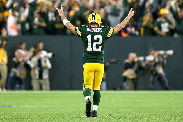 GREEN BAY, WI - SEPTEMBER 09:  Aaron Rodgers #12 of the Green Bay Packers reacts after throwing a touchdown pass to Randall Cobb #18 during the fourth quarter of a game against the Chicago Bears at Lambeau Field on September 9, 2018 in Green Bay, Wisconsin.  (Photo by Dylan Buell/Getty Images)