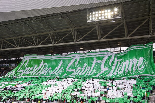 Saint-Etienne's supporters cheer prior to the start of the French L1 football match between AS Saint-Etienne and Amiens SC on September 2, 2018, at the Geoffroy Guichard stadium in Saint-Etienne, central France. (Photo by PHILIPPE DESMAZES / AFP)        (Photo credit should read PHILIPPE DESMAZES/AFP/Getty Images)