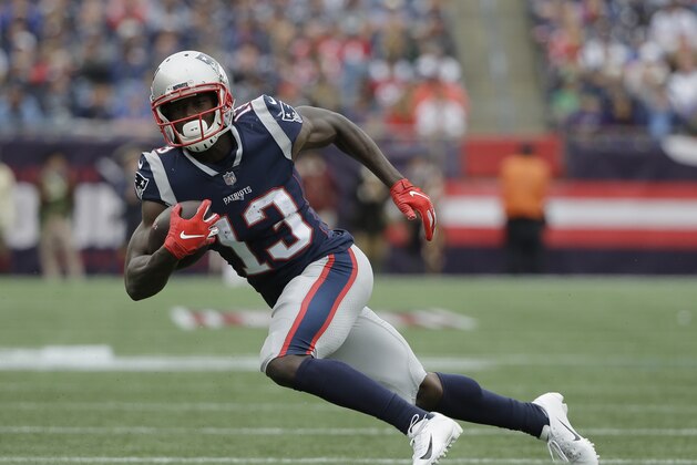 New England Patriots wide receiver Phillip Dorsett (13) runs with the ball during the second half of an NFL football game against the Houston Texans, Sunday, Sept. 9, 2018, in Foxborough, Mass. (AP Photo/Steven Senne)
