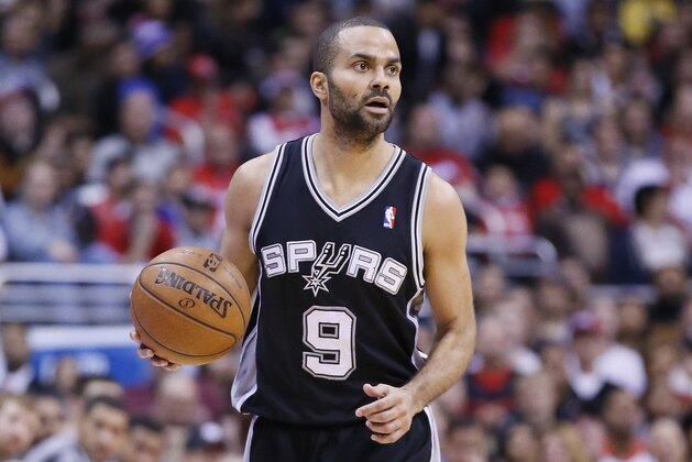 LOS ANGELES, CA - DECEMBER 16: San Antonio Spurs point guard Tony Parker (9) brings the ball upcourt during the Los Angeles Clippers 115-92 victory over the San Antonio Spurs at the Staples Center at the Staples Center on December 16, 2013 in Los Angeles, California. NOTE TO USER: User expressly acknowledges and agrees that, by downloading and or using this photograph, User is consenting to the terms and conditions of the Getty Images License Agreement. (Photo by Chris Elise/Getty Images)