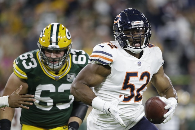 Chicago Bears' Khalil Mack intercepts a pass and returns it for a touchdown during the first half of an NFL football game against the Green Bay Packers Sunday, Sept. 9, 2018, in Green Bay, Wis. (AP Photo/Jeffrey Phelps)