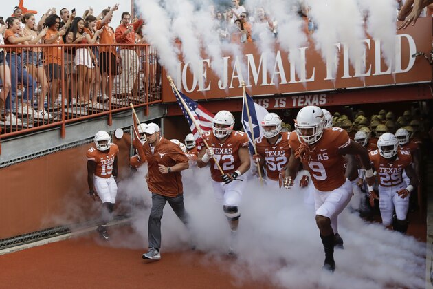 AUSTIN, TX - SEPTEMBER 08:  Head coach Tom Herman of the Texas Longhorns leads the team on to the field before the game against the Tulsa Golden Hurricane at Darrell K Royal-Texas Memorial Stadium on September 8, 2018 in Austin, Texas.  (Photo by Tim Warner/Getty Images)
