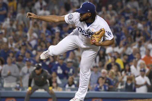 Los Angeles Dodgers relief pitcher Kenley Jansen follows through on a pitch during a baseball game against the Arizona Diamondbacks, Saturday, Sept. 1, 2018, in Los Angeles. (AP Photo/Michael Owen Baker)