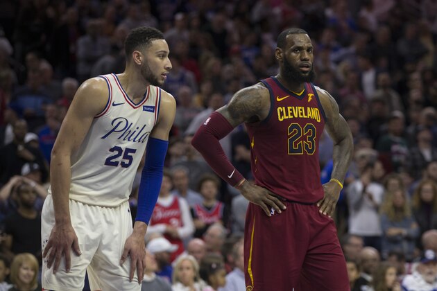 PHILADELPHIA, PA - APRIL 6: Ben Simmons #25 of the Philadelphia 76ers and LeBron James #23 of the Cleveland Cavaliers look on during foul shots at the Wells Fargo Center on April 6, 2018 in Philadelphia, Pennsylvania. NOTE TO USER: User expressly acknowledges and agrees that, by downloading and or using this photograph, User is consenting to the terms and conditions of the Getty Images License Agreement. (Photo by Mitchell Leff/Getty Images) *** Local Caption *** Ben Simmons;LeBron James