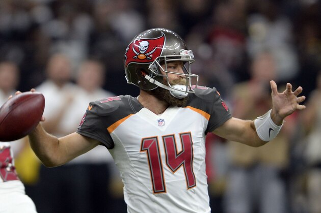 Tampa Bay Buccaneers quarterback Ryan Fitzpatrick (14) passes in the first half of an NFL football game against the New Orleans Saints in New Orleans, Sunday, Sept. 9, 2018. (AP Photo/Bill Feig)