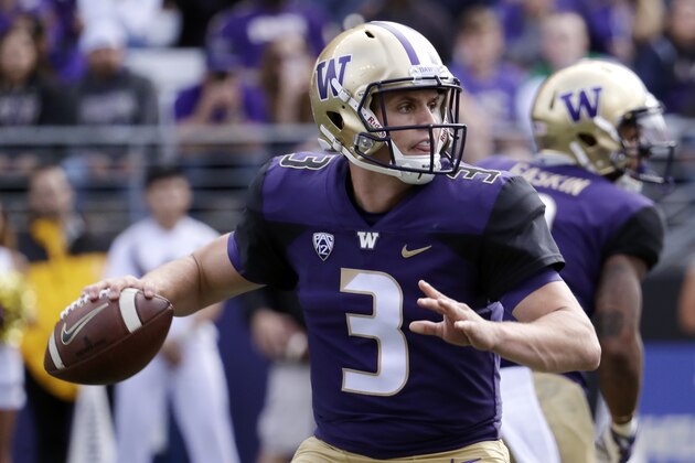 Washington quarterback Jake Browning in action against North Dakota in the second half of an NCAA college football game Saturday, Sept. 8, 2018, in Seattle. (AP Photo/Elaine Thompson)