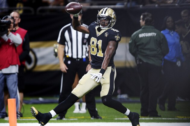 FILE - In this Aug. 30, 2018, file photo, New Orleans Saints wide receiver Cameron Meredith (81) celebrates his touchdown reception in the first half of an NFL preseason football game against the Los Angeles Rams in New Orleans. The addition of free agent Meredith and rookie Tre’Quan Smith, combined with the four-game suspension of 2017 rushing leader Mark Ingram, has set the stage for the Saints to revert to a more pass-heavy attack--if they choose. (AP Photo/Bill Feig, File)
