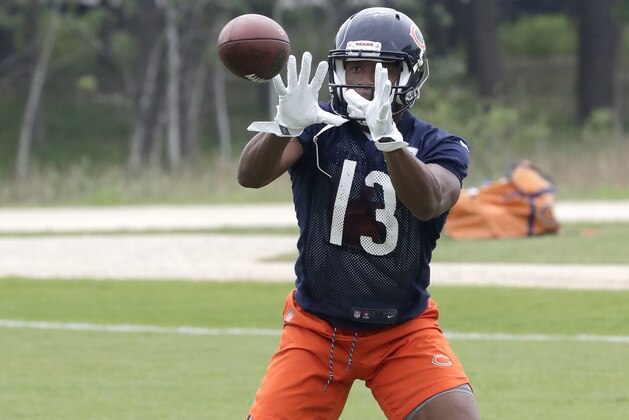 Chicago Bears wide receiver Bennie Fowler catches a pass during practice at the NFL football team's training camp Wednesday, May 30, 2018, in Lake Forest, Ill. (AP Photo/Charles Rex Arbogast)